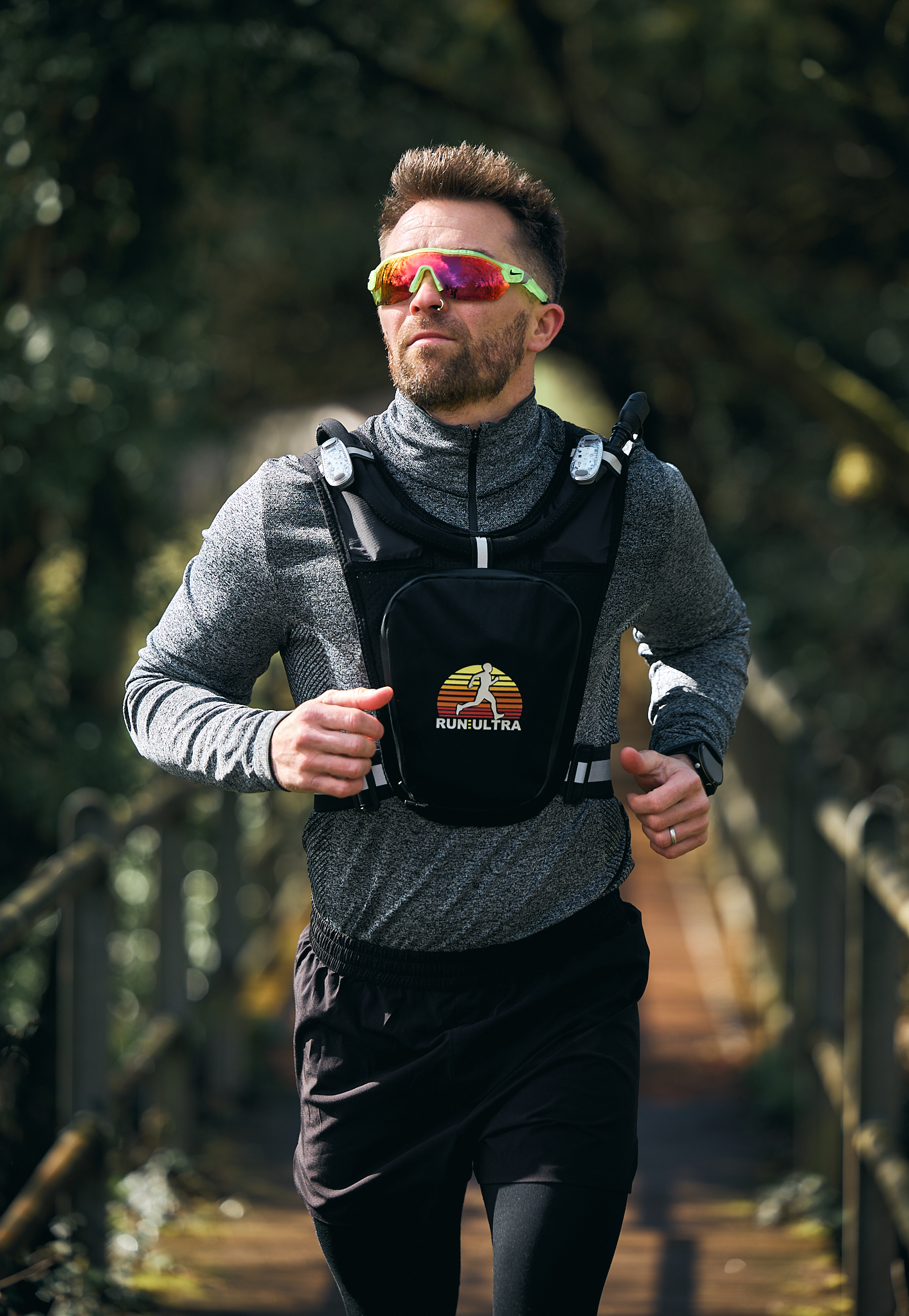 Trail runner wearing the Run Ultra hydration vest